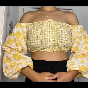 Yellow and white crop-top.